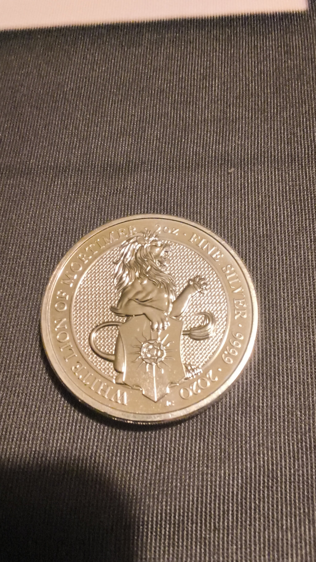 2020 2OZ OF .999 FINE SILVER WHITE LION OF MORTIMER